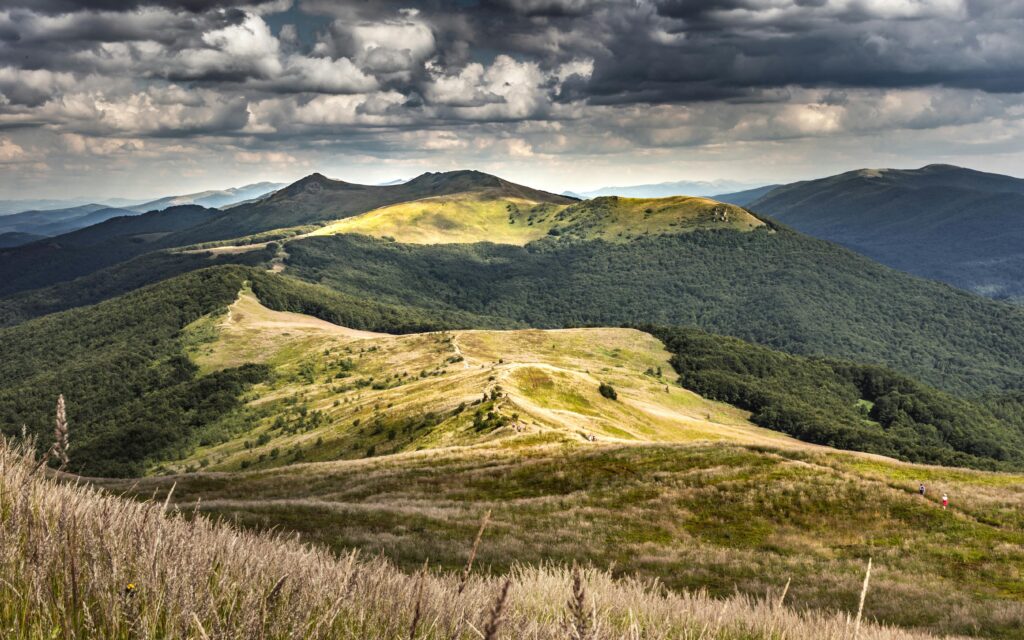 pexels-photo-7430407-7430407 Breathtaking view of Bieszczady Mountains under a dramatic sky in Podkarpackie, Poland.